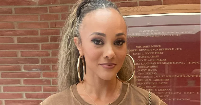 Ashley Darby smiling in a stylish outfit, symbolizing her reality TV fame and business ventures, representing Ashley Darby Net Worth.