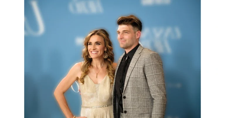 Rebecca St. James with husband Jacob 'Cubbie' Fink at a formal event, reflecting the Christian artist's personal life which contributes to her estimated $1-5 million net worth in 2025.