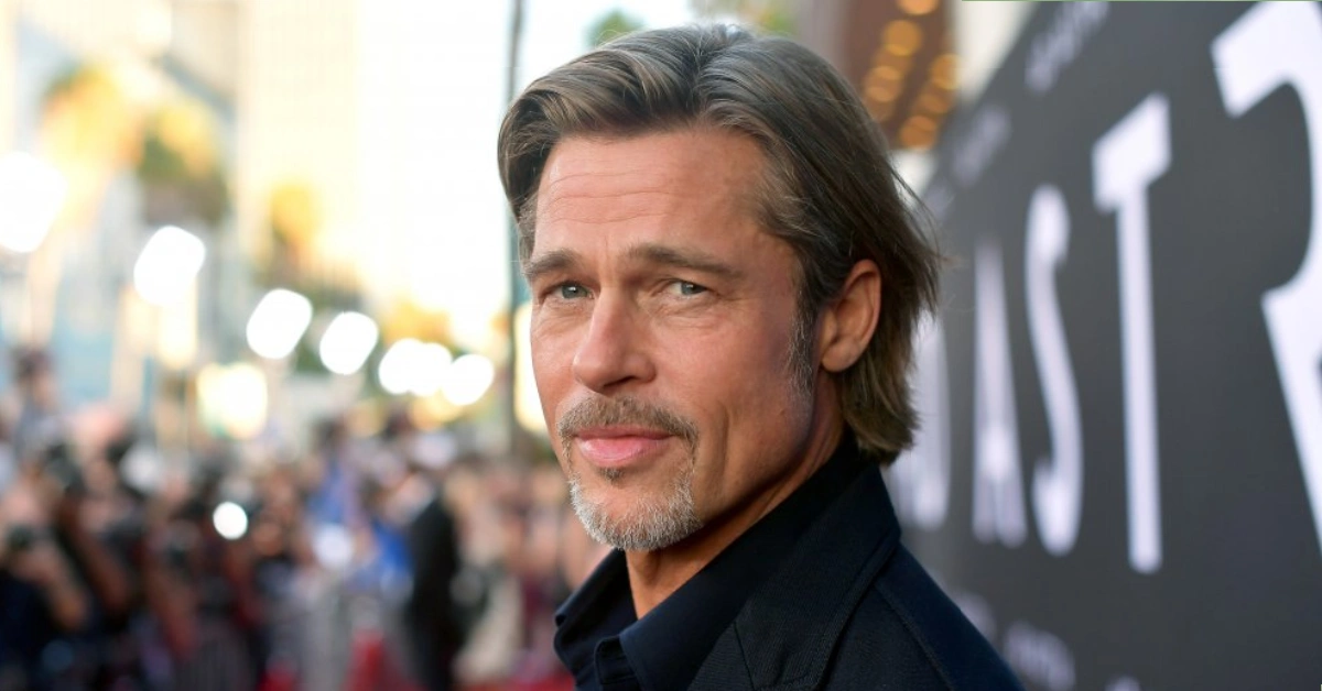 Brad Pitt Net Worth: Brad Pitt smiling on the red carpet, showcasing the Hollywood star’s success and wealth in 2025.