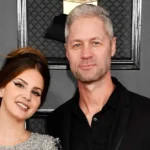 Sean Larkin Wife: Sean Larkin and his former partner posing together at a red carpet event, highlighting their relationship for the article.