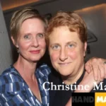 Christine Marinoni, education supporter and LGBTQ+ advocate, pictured with her wife Cynthia Nixon, symbolizing their shared commitment to equality and social justice.