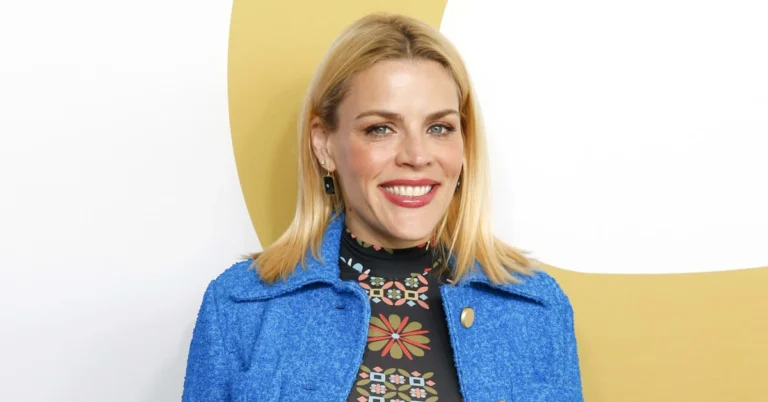 Busy Philipps smiling confidently on the red carpet, symbolizing her successful career and financial achievements — Busy Philipps Net Worth.